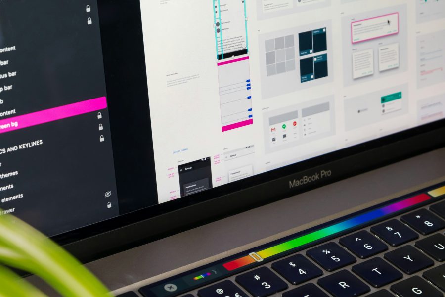 Computer monitor showing app designer improving UI design